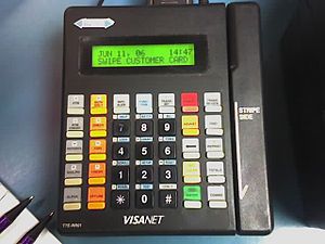 A typical credit card terminal that is still p...